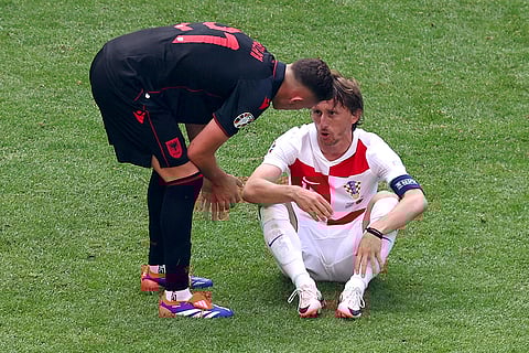 Kristjan Asllani and Luka Modric